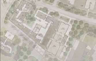 Aerial campus site plan showing buildings, roads, and tree cover